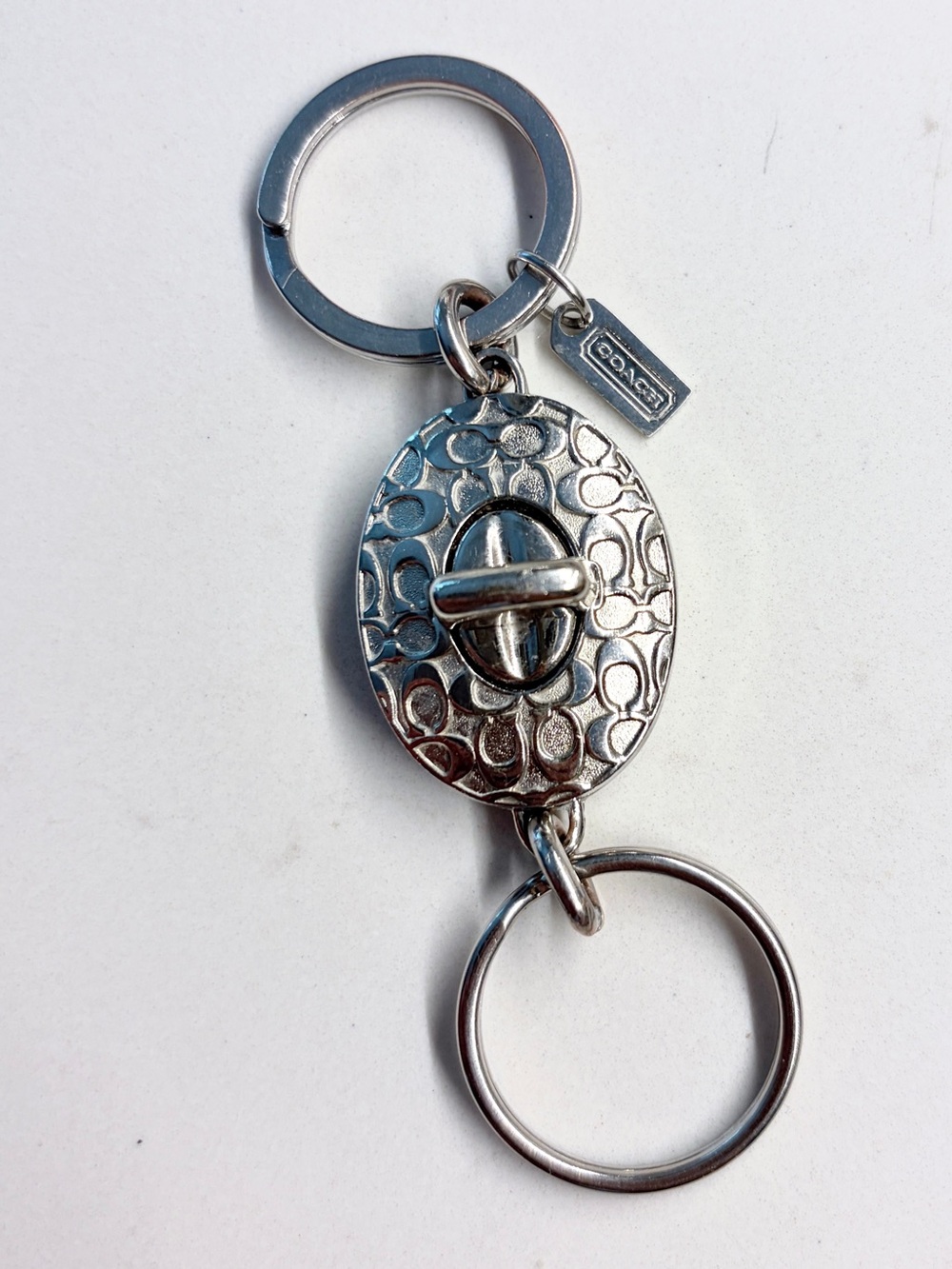 COACH Silver Signature Embossed Turnlock Valet Key Ring Fob